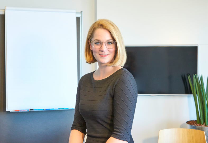 Picture of a woman in a meeting room